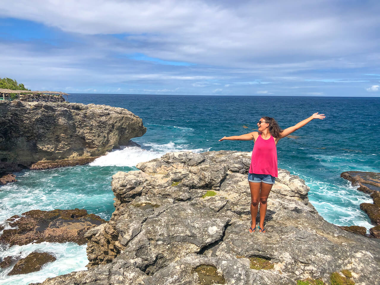nicola in a pink tank top at animal flower cave barbados, things i love about barbados