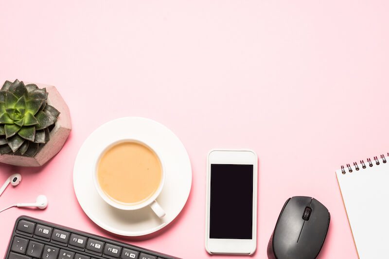 Pink desk with keyboard and coffee, Virtual Savvy System Review