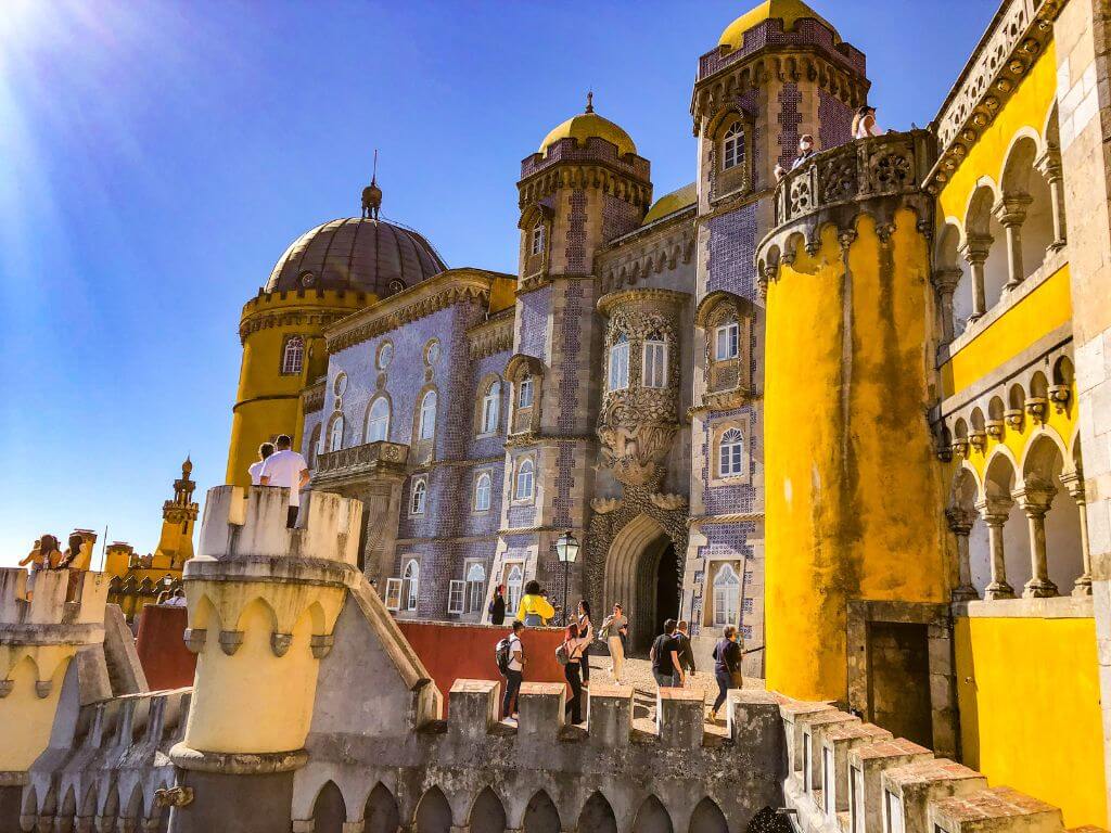 Yellow, blue, and red exterior walls of the Pena Palace Sintra