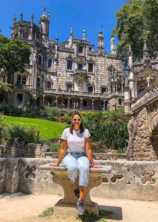 Nicola sitting outside the Quinta da Regaleira Palace in Sintra