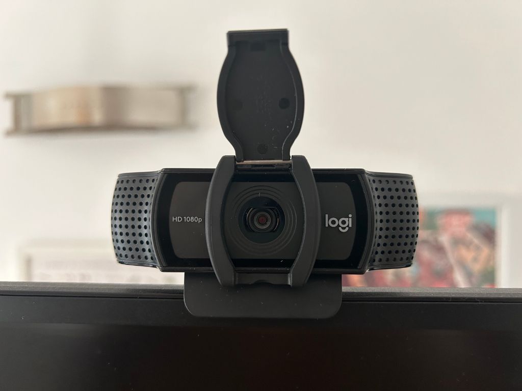 The Logi 920 external webcam mounted on a monitor 